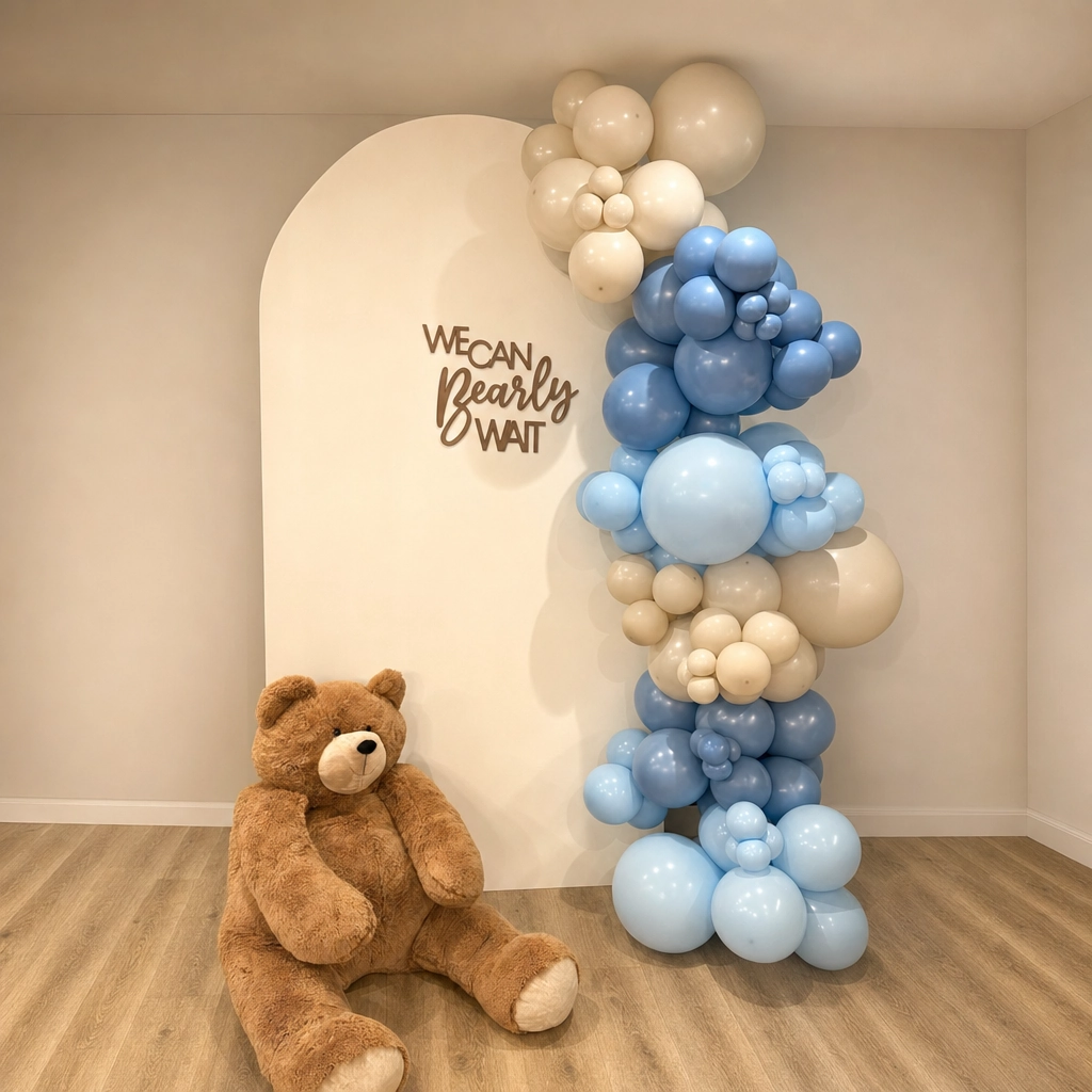 Blue and beige bear themed baby shower balloon backdrop