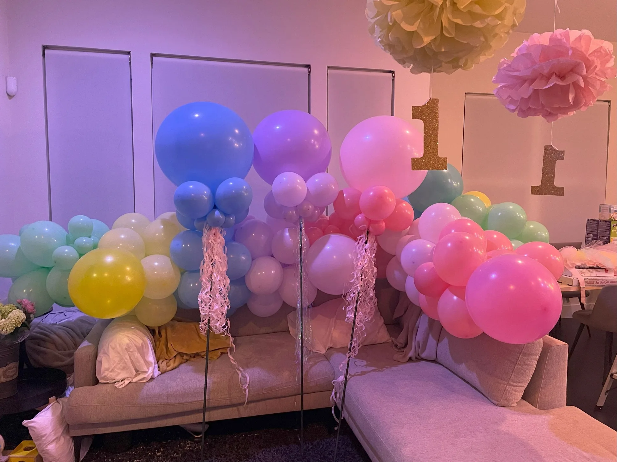 Pastel balloon clusters styled as floating jellyfish